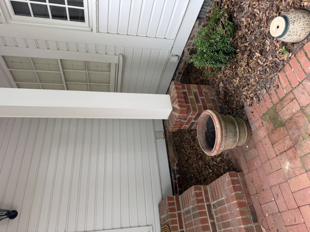 After: front porch area of Pinehurst Village home cleared of all construction debris