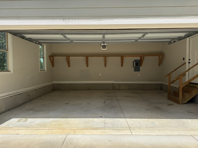 Garage after cleanout — empty and broom-clean in Moore County NC